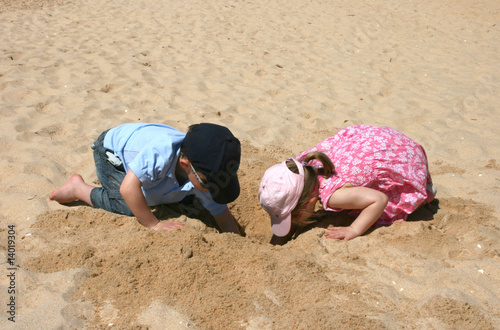 Children digging in the sand