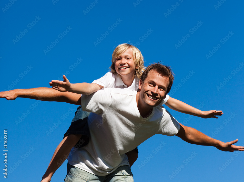Child on his father's back