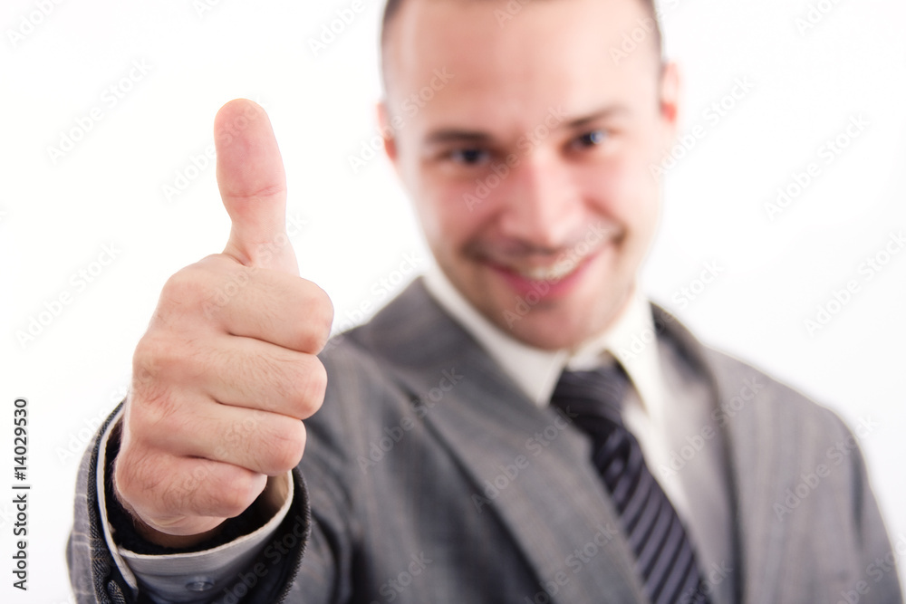 Successful business man looking happy over a white background Successful business man looking happy over a white background