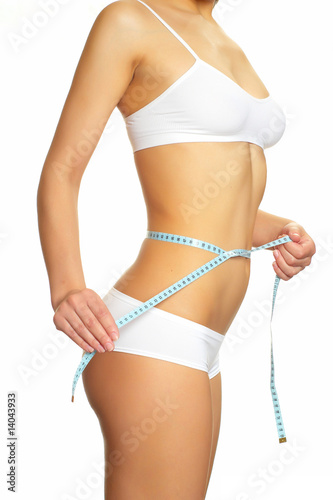 Women measures a waist