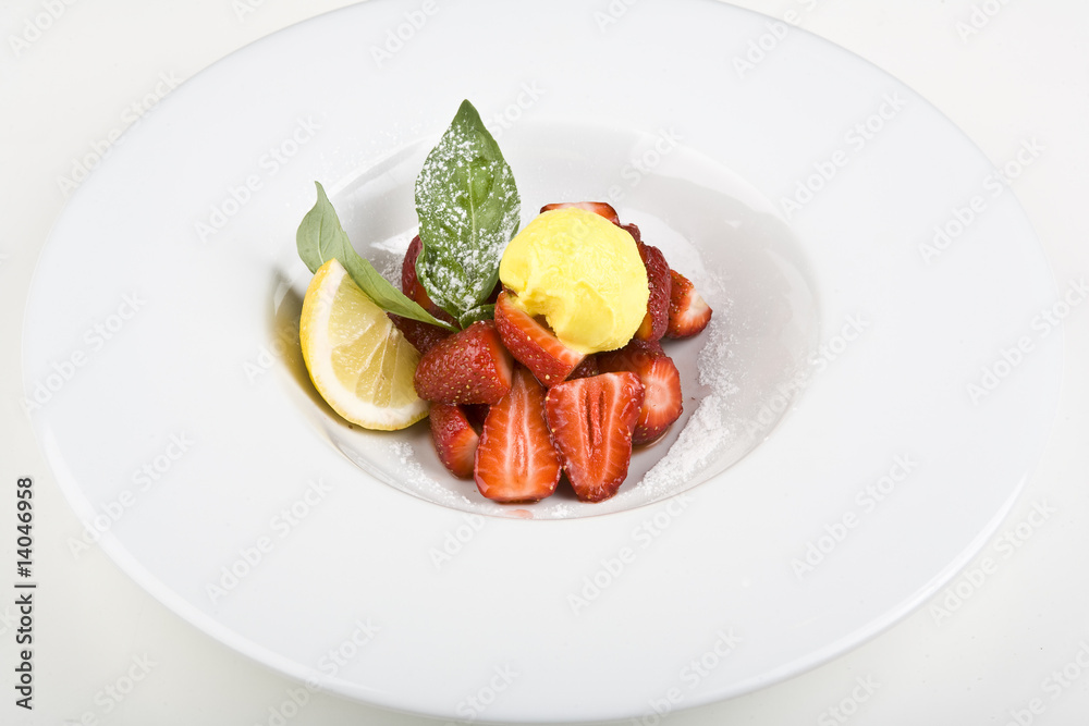 Peach or mango icecream sundaes with strawberries Peach or mango icecream sundaes with strawberries