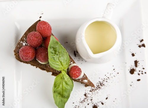 raspberry cheesecake with vanilla garnish photo