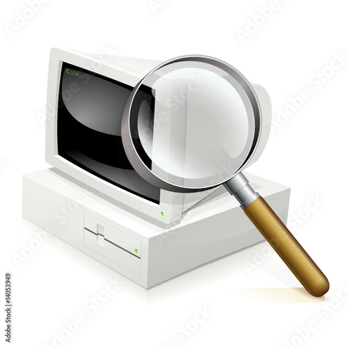 Ordinateur des années 80 à la loupe (reflet)