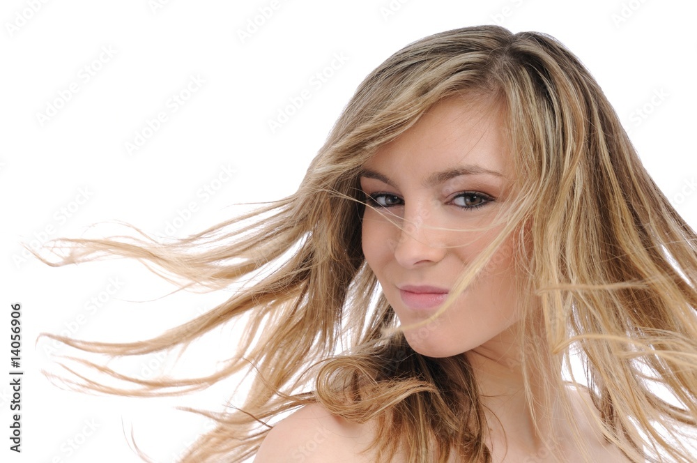 Portrait of young woman with flying hair Portrait of young woman with flying hair