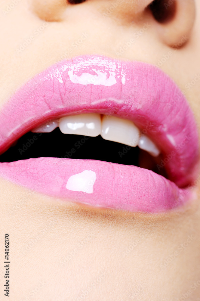 Naklejka premium female lips with bright pink lipstick