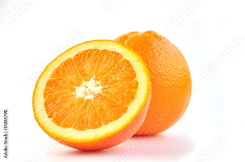Juicy oranges on white.