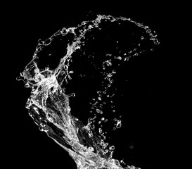 Stylish water splash. Isolated on black background