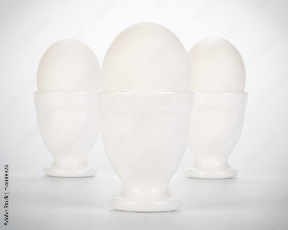 Three eggs in eggcups Three eggs in eggcups