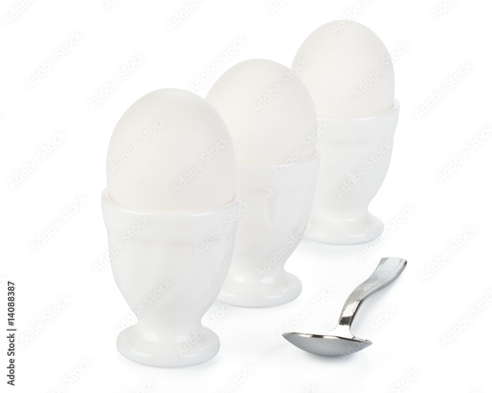 Three eggs in eggcups Three eggs in eggcups
