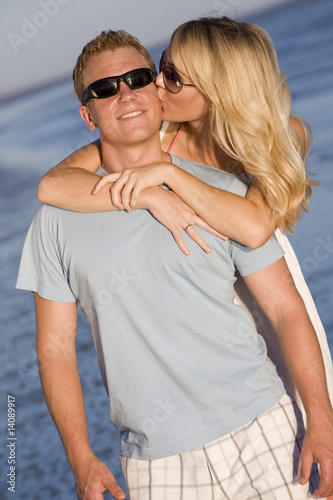 A young couple on the beach in love