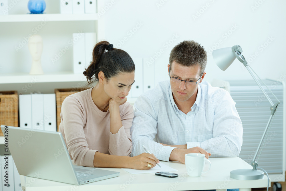 Couple working at home Couple working at home