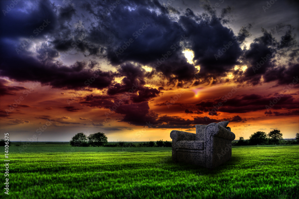 Fototapeta premium Abstract armchair in the idyllic field