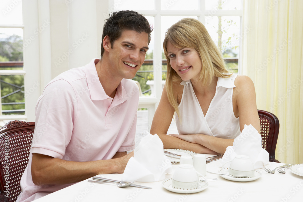 Young Couple Enjoying Hotel Meal Young Couple Enjoying Hotel Meal
