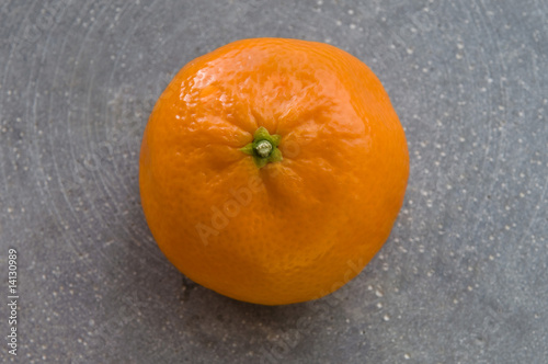 Single Clementine on Clay Dish