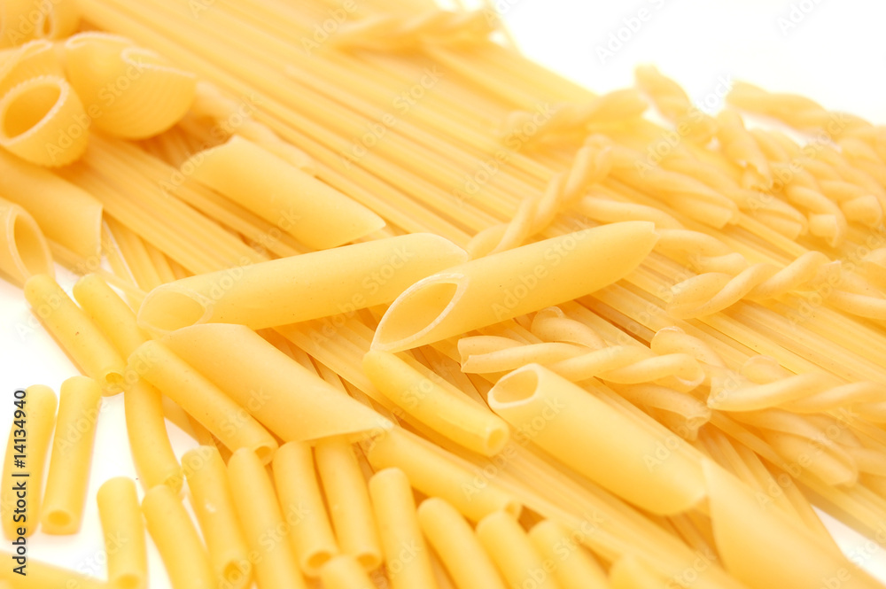 various shapes of pasta background various shapes of pasta background