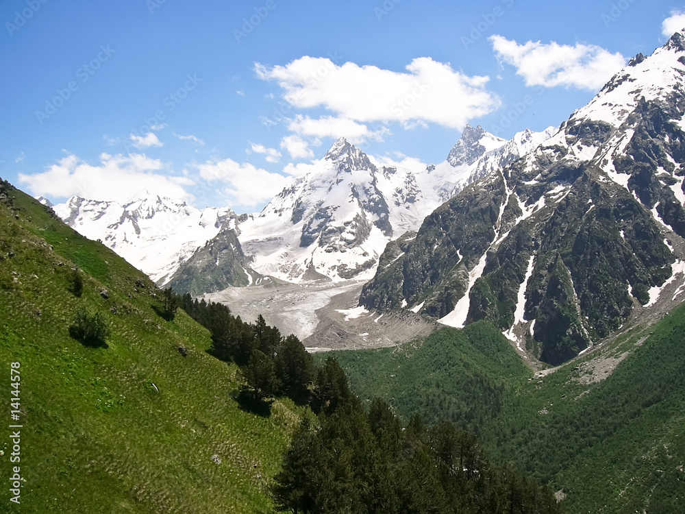 High mountains with snow in summer
