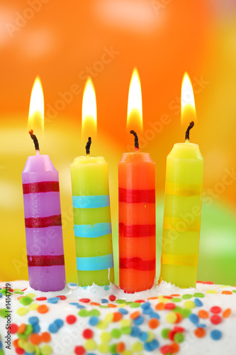 Birthday candles on colorful background photo