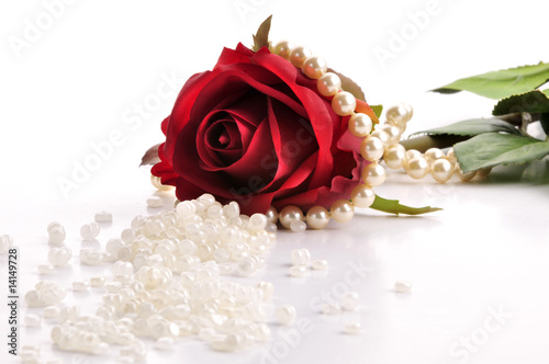 rosa and a pearl necklace
