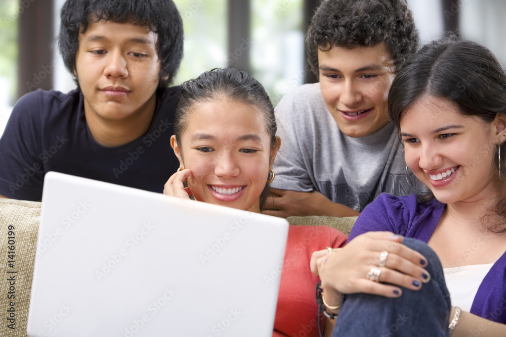 Group of student watching the laptop Group of student watching the laptop