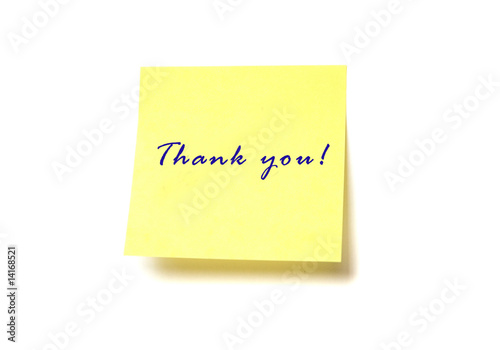 Yellow post it with words "Thank you" isolated on white