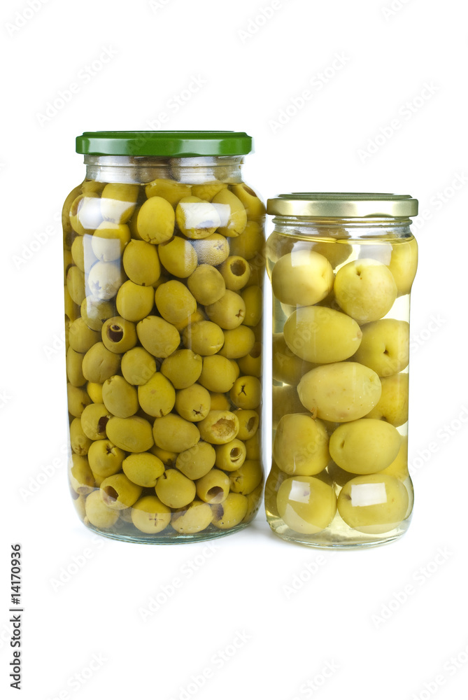 Glass jars with pitted and giant green olives Glass jars with pitted and giant green olives