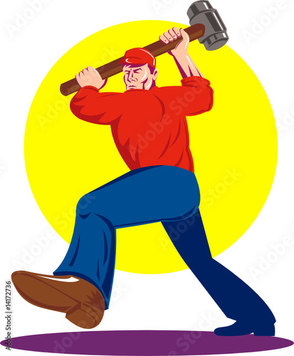 Worker slinging a sledge hammer