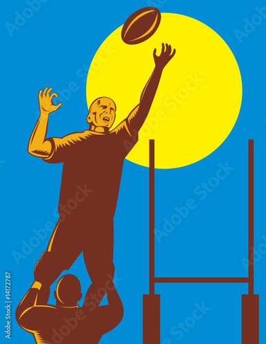 Rugby player catching a lineout throw