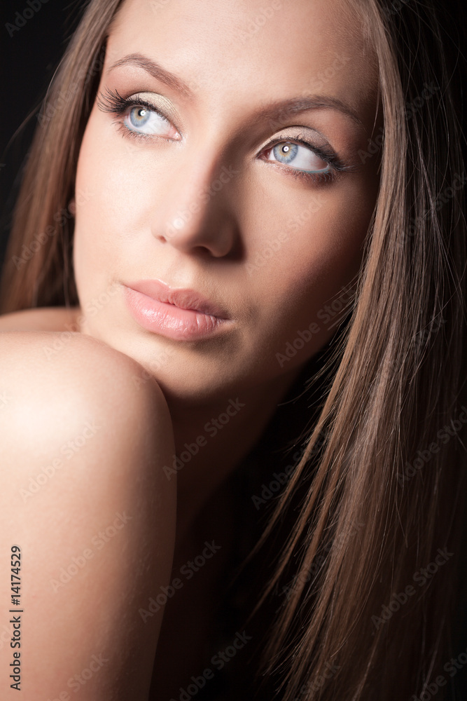 Obraz premium Portrait of attractive brown-haired girl