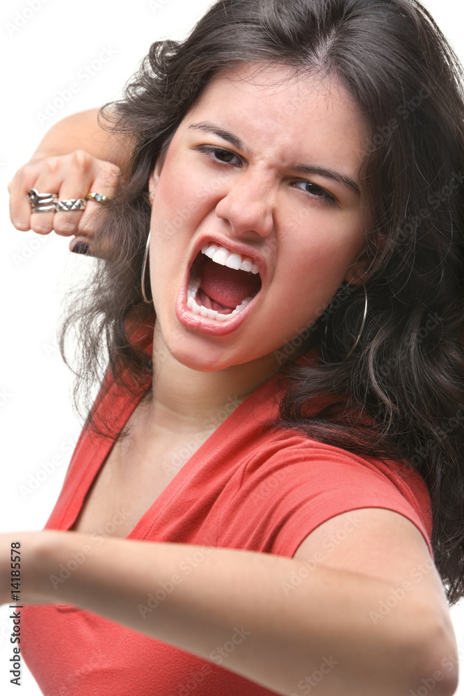 Young female expressing her anger Young female expressing her anger