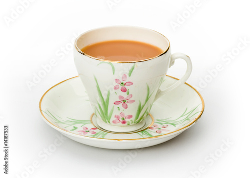 Tea served in a hand painted cup and saucer