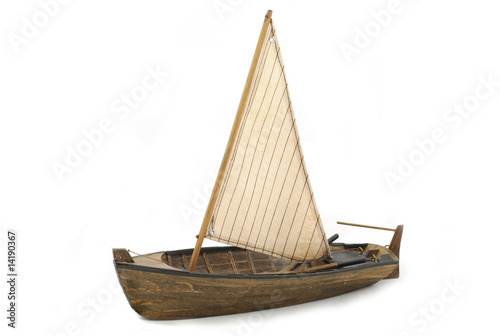 Wooden sailboat isolated on white background