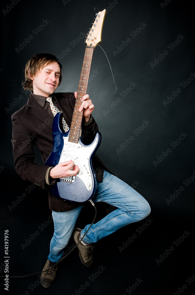 Fototapeta premium Man playing electro guitar