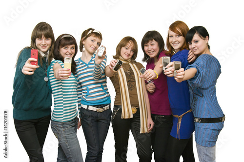 Group of the girls showing mobile phones