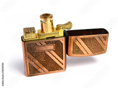 Old Bronze lighter on white background