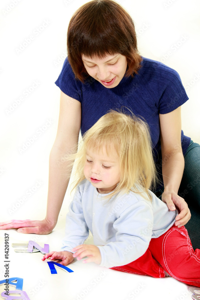 mother and daughter studing letters, over white mother and daughter studing letters, over white