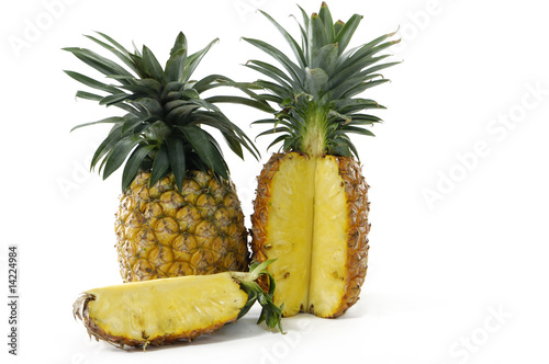 ripe pineapple on white background with slices