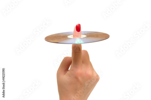 female hand holds a disk on a white background