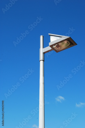 Modern street lamp with blue sky background