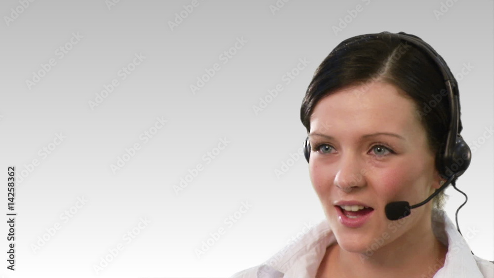 Portrait of a young woman working in a call center Portrait of a young woman working in a call center
