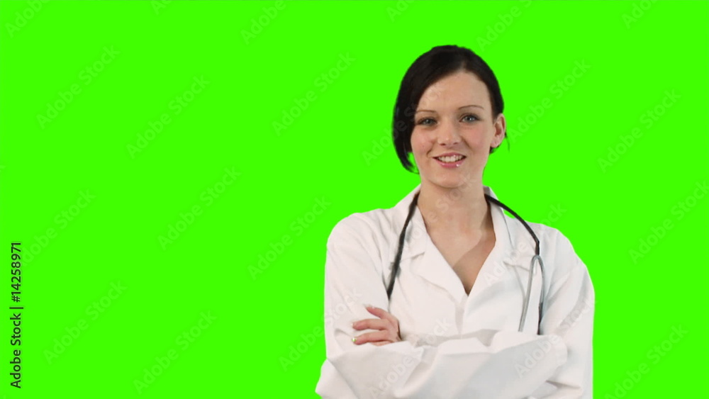 Portrait of a female youn doctor with folded arms Portrait of a female youn doctor with folded arms