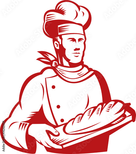 Baker holding a loaf of bread
