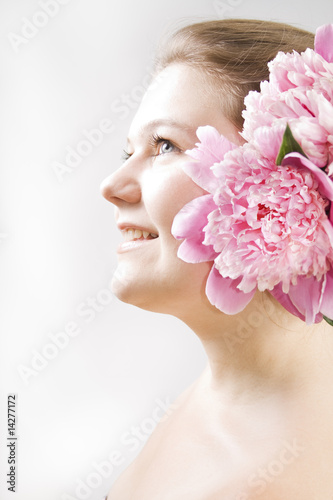 Face of woman with flower