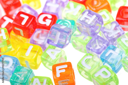 Abstract colourful alphabet blocks to background