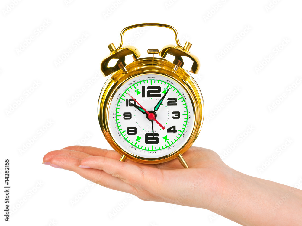 Hand with alarm clock Hand with alarm clock