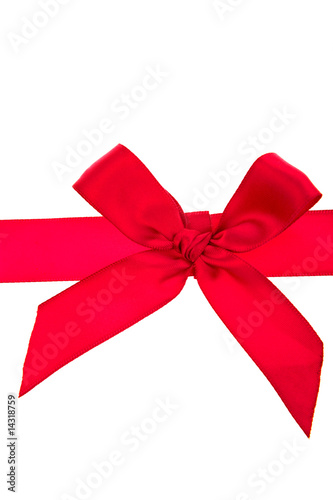 Red bow and ribbon over white