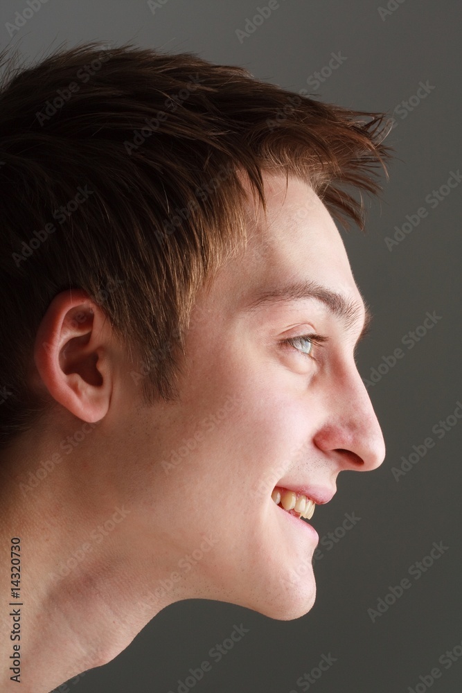 Fototapeta premium Profile. Smiling man close up.