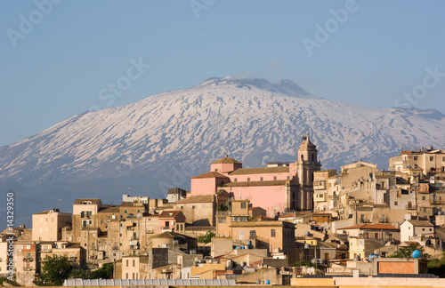 view of village and belltower on background Etna photo