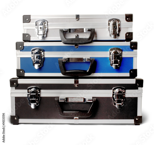 three isolated suitcases