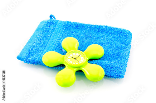 Fotografie Blue washcloth with green shower clock