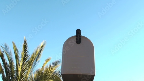 Woman reaches for mail - HD